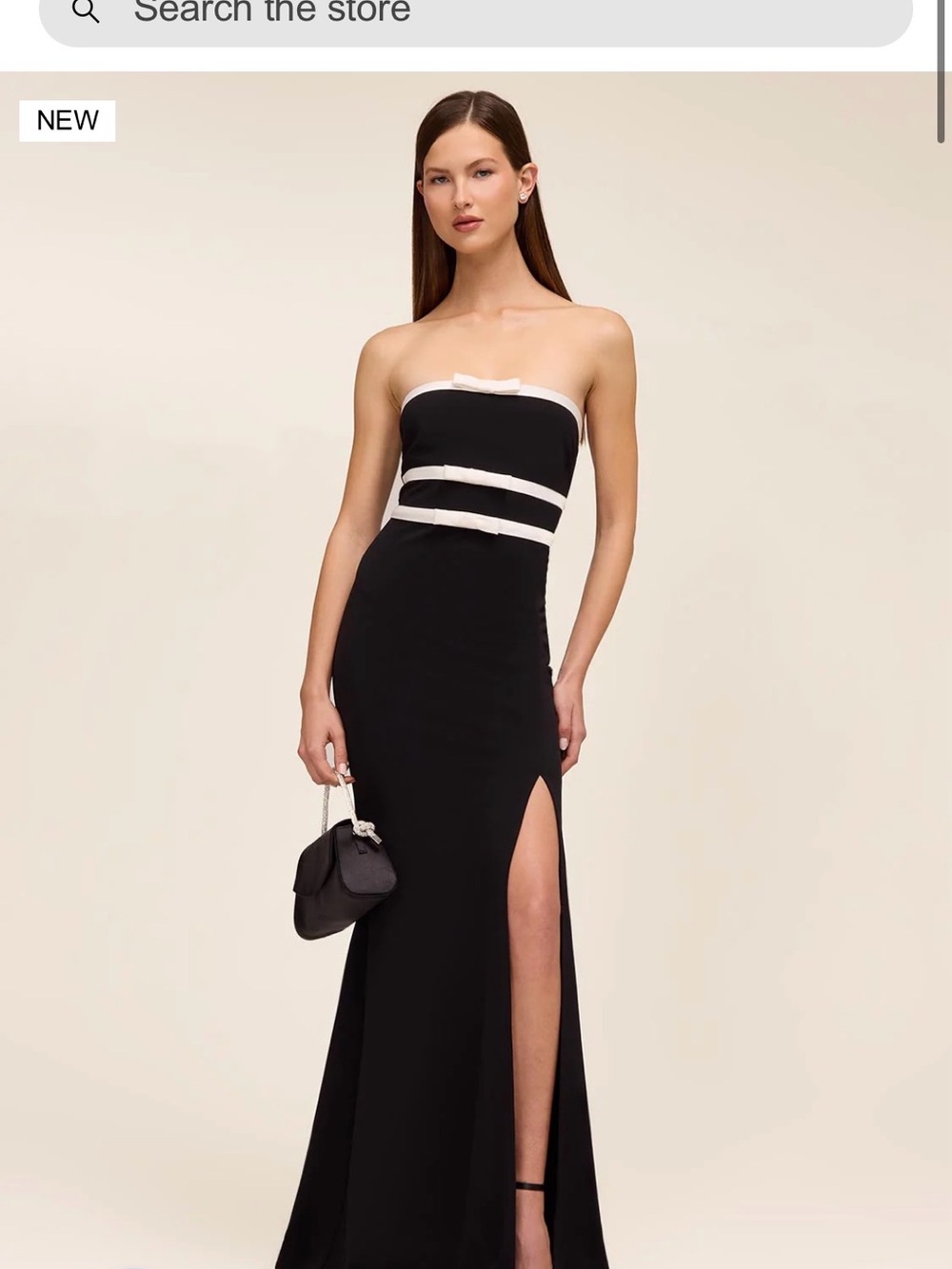 le chateau Black Strapless Gown with Ivory Trim